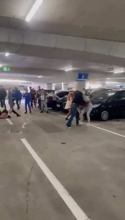 Girls THROWING DOWN in parking garage 1 of 2...