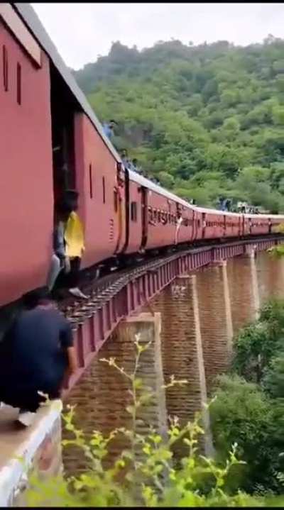 Filming a train crossing bridge while being on the bridge