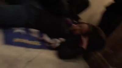 Footage of woman being shot inside the capitol building.