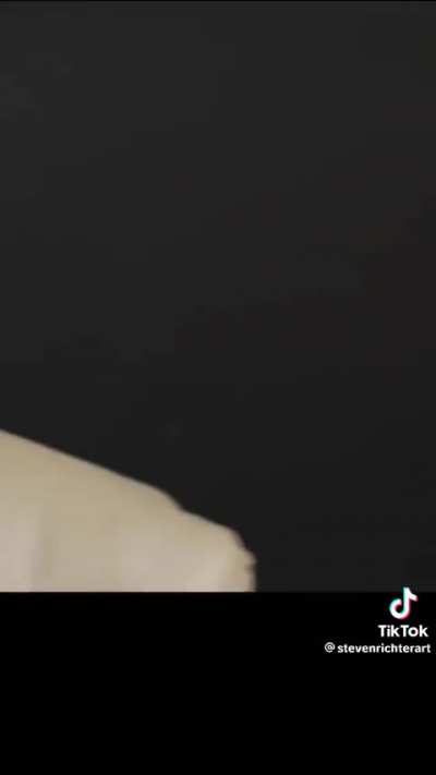 A sculpture of Donald Trump’s famous mugshot seems to be built. The sculpture has a high accuracy to the mugshot. This is a difficult task to accomplish. The song “Bad Boys” from Inner Circle is playing throughout the clip.
