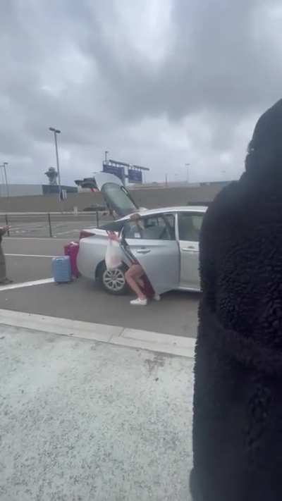 Woman assaults Uber driver after throwing his stuff in the street at LAX