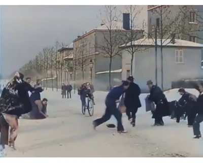 Snowball fight from 125 years ago (1897) in Lyon, France That has been colorized and speed adjusted.