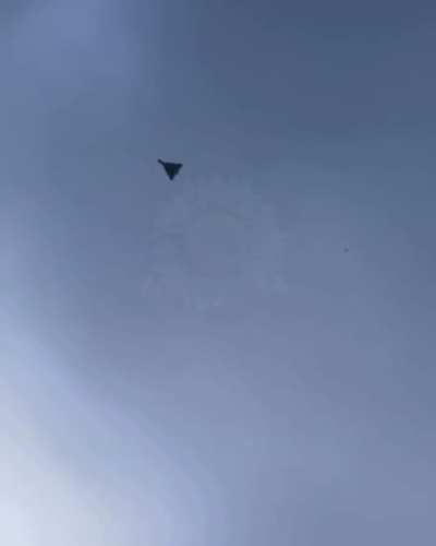 Ukrainian FPV interceptor air bursts behind Russian drone, followed by an air defense missile a few seconds after [March 7th 2026]
