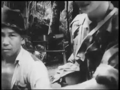 British forces raiding a village in Malaya to find suspected communist insurgent during the Malayan Emergency, 1952.