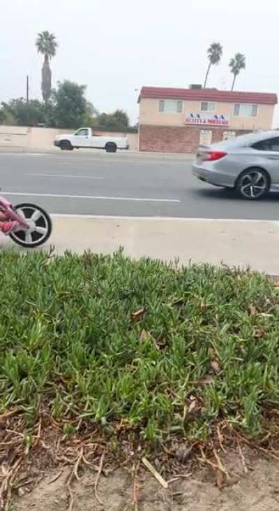 I was waiting outside of the barbershop for my turn