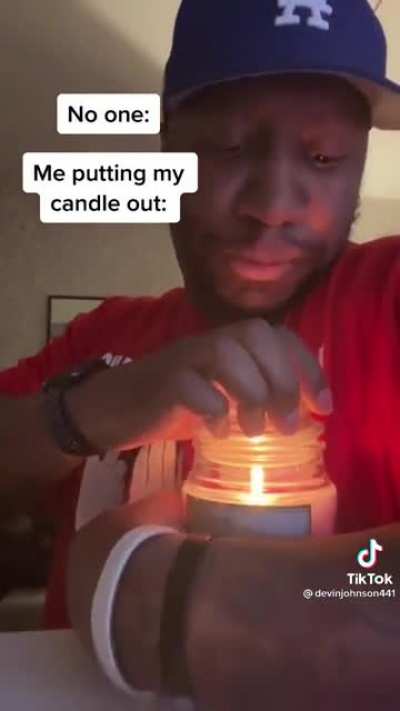 Putting out candle