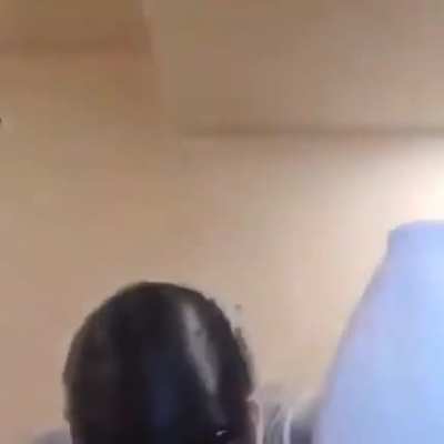 Pouring bleach on his face