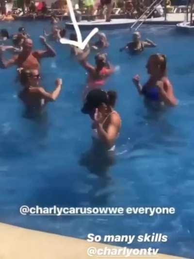 Charly dancing in a pool