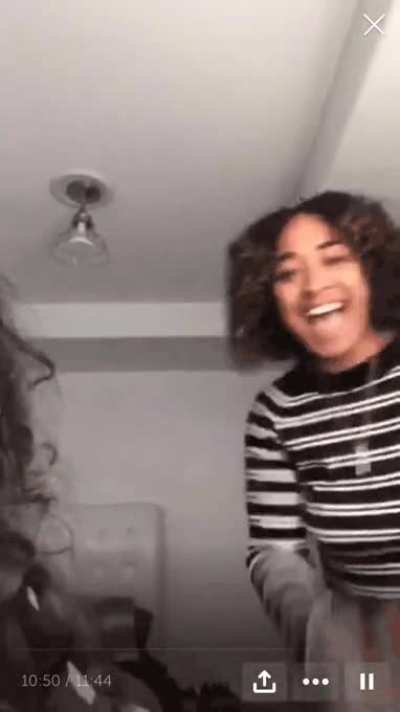 "Friend" lifts shirt