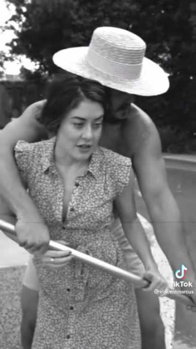 50s couple and their pool boy