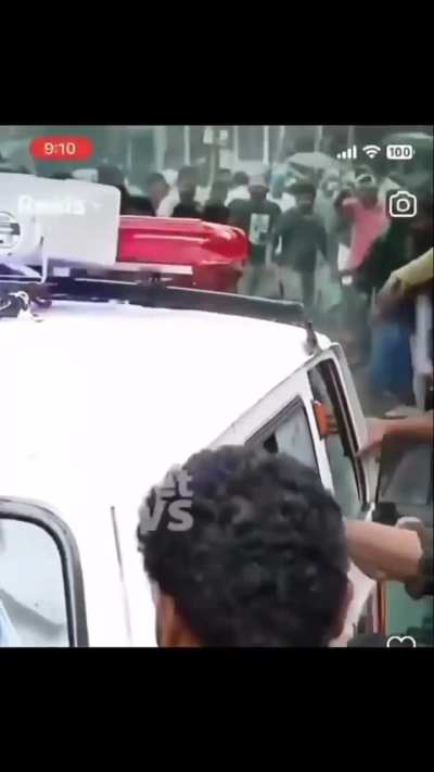 Crowd fight takes a break to let ambulance go through 