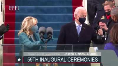Joe Biden fist-bumps Barack Obama