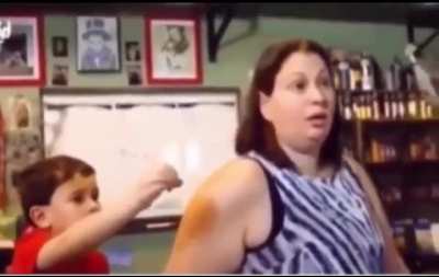 Sons reaction to his mom passing out(acting) while getting a tattoo.