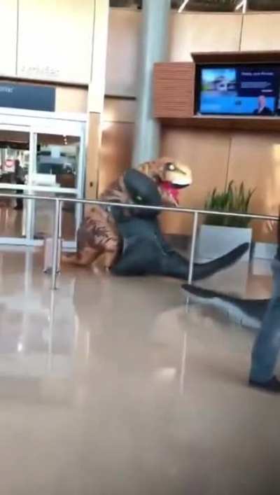 Kids greet their mom at the airport