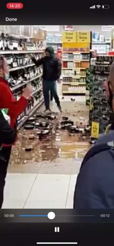 Local junkie smashes up the alcohol aisle in Tesco Drogheda, Ireland 21-10-2020