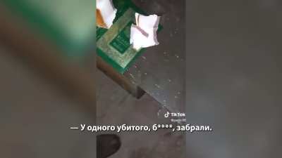 Ukrainian soldiers use Quran book taken from killed as cutting board for salo (pork fat)