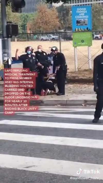 An unarmed member of the press was dragged through the street by the LAPD, who wouldn&rsquo;t render him aid, despite his cries of pain.