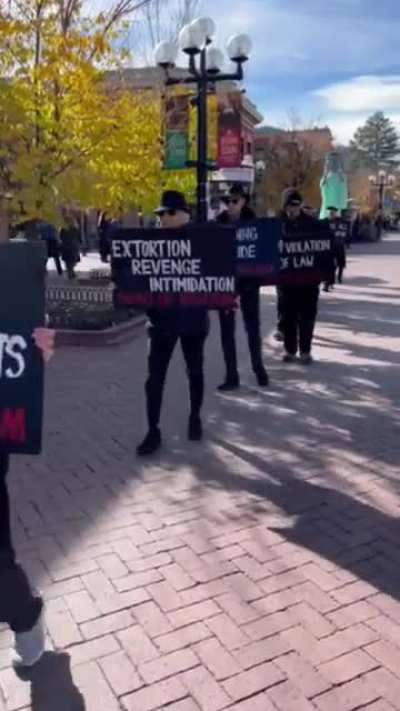 Signs of Fascism. Pearl Street Mall. Today.