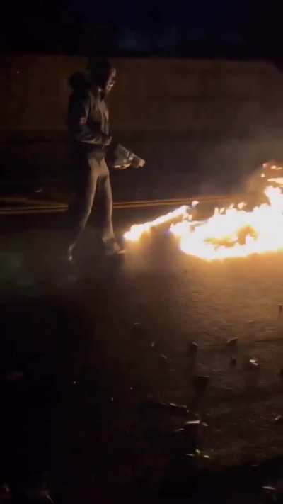 Idiot with a flamethrower.