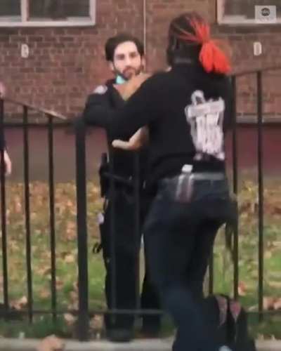 Horrible cops throw cat into a burning building