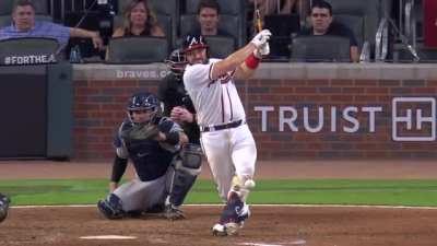 MLB player's bat hits the baseball a second time after breaking.