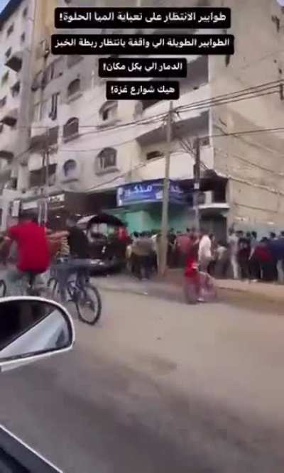 People in lines for water and bread as israel cut supplies and bombed most of bakeries and market places
