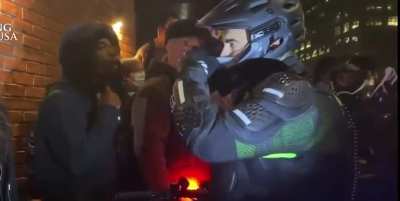 Woman spits in the face of a police officer