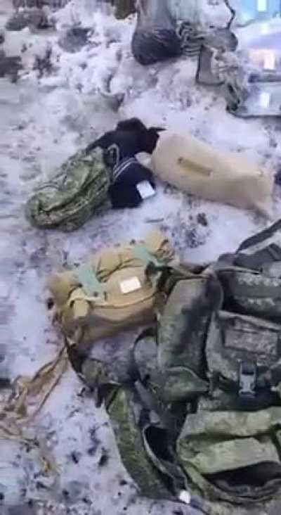 Footage appears to show evidence of Russian soldiers giving up the fight on Day 1, taking off their uniforms and fleeing.