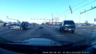 Idiot blows through red light and hits &amp;amp; flips an SUV carrying an entire family right in front of me.