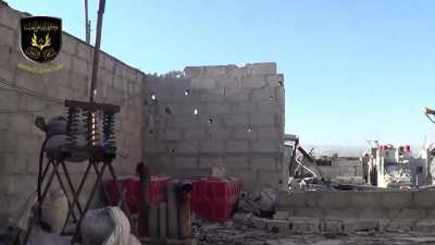 FSA fighters use a homemade catapult to launch improvised explosives/incendiary devices at SAA positions - Damascus - 9/15/2013