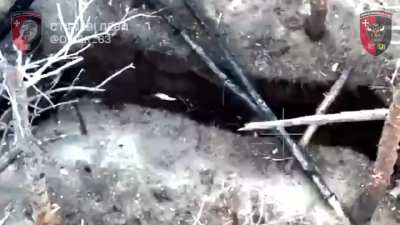 Drone footage of a Russian throwing a grenade at an approaching Ukrainian UAV. However, it ricocheted off the trench and flew straight into the shelter of one of his comrades.