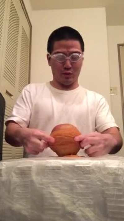 Putting rubber bands on an apple