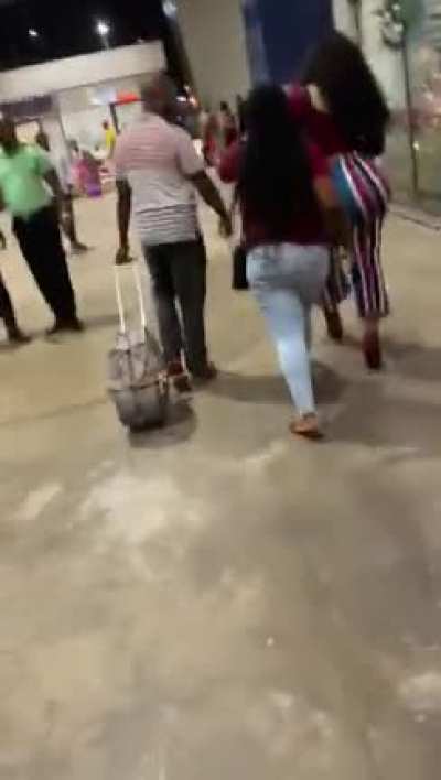 Woman gets lot's of attention at the airport for having big....