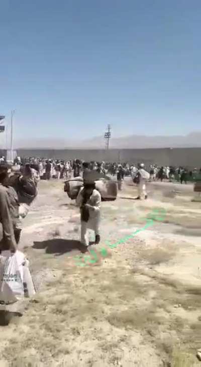 Prisoners leaving Kabul jail after being broken out by Taliban.