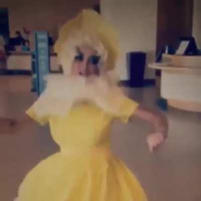 This yellow dress suits her I must say