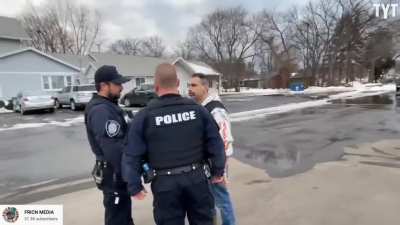 This PoS cop trying to intimidate people