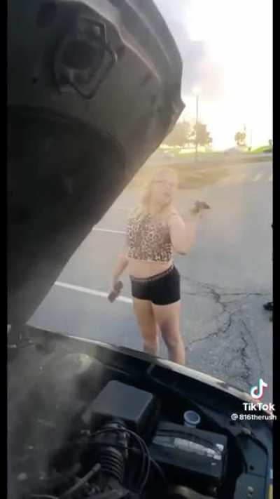 Possibly drunk (and alone) 11 year old crashed her parents car in a parking lot. Group of teens films the aftermath.