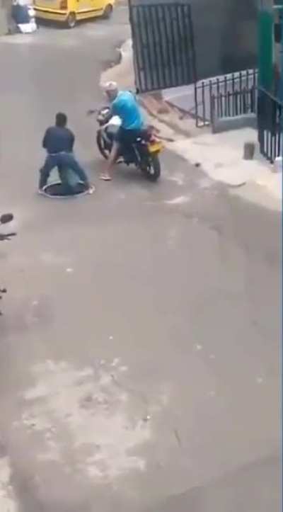 That's really dangerous. Someone should put a manhole cover over that.