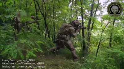 UA pov A video shows Ukrainian "Omega" special-ops team in action