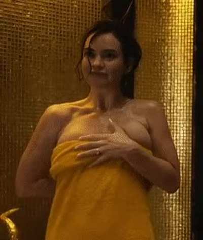 &ldquo;Oh hey baby! What are you&hellip; I was in the shower why would you come in here?&rdquo; Mommy Lily James asks as she covers her sexy body up