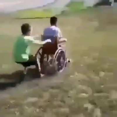 wcgw rolling down a hill on a wheel chair (volume warning?)