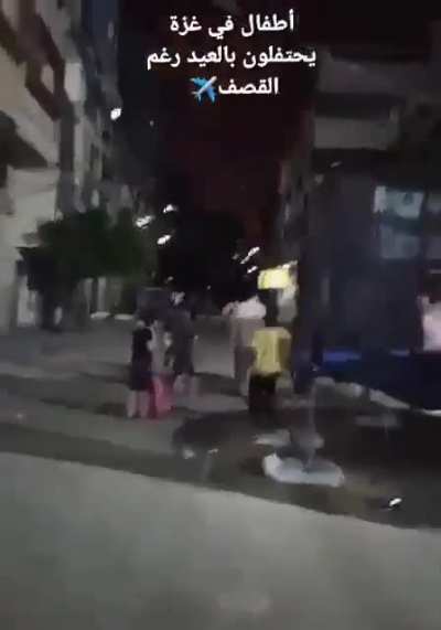 Unreal scene in Gaza minutes ago. Children still celebrating Eid during heavy IDF shelling.