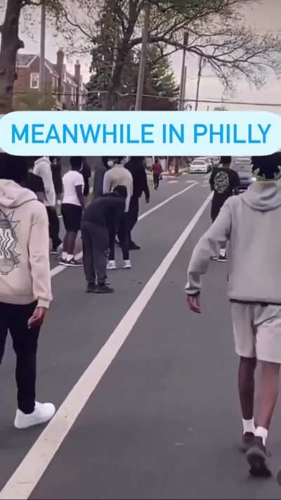 Mob attacking random cars in traffic