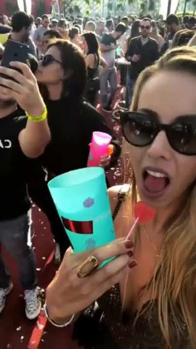 Dude put "something" stealthily on the girl's drink.
