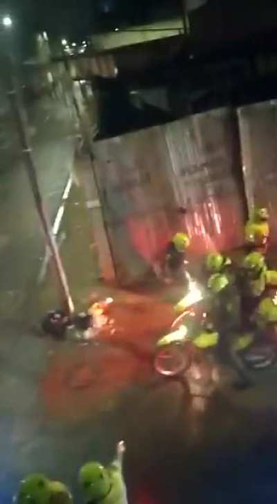 Colombian cops dont play they will chase you and beat you.. this is going on with the riots. Houses are being burned and people are being shot to death as well. Sad