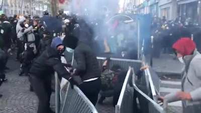 Compilation of today protests in Paris against the Global Security bill - The new article would amend current legislation to make it an offense to show the face or identity of any officer on duty "with the aim of damaging their physical or psychological i