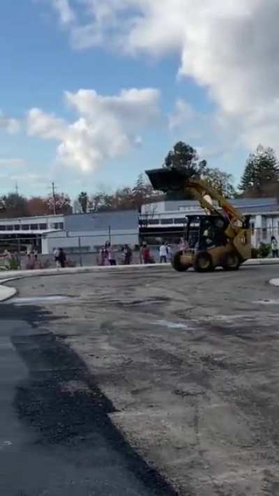 Construction Worker Shows Off for School Kids