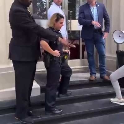 Demented MAGA Karen Laura Loomer is outside Ron Desantis&rsquo; fundraiser with a bullhorn, yelling at him through the crack in the door. Finally security and the police come out and threaten to arrest her.