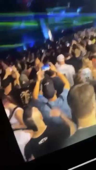 Guy spiking a drink at a festival today