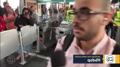 Angry man at subway station tells TV station to f*ck off (Brazil).